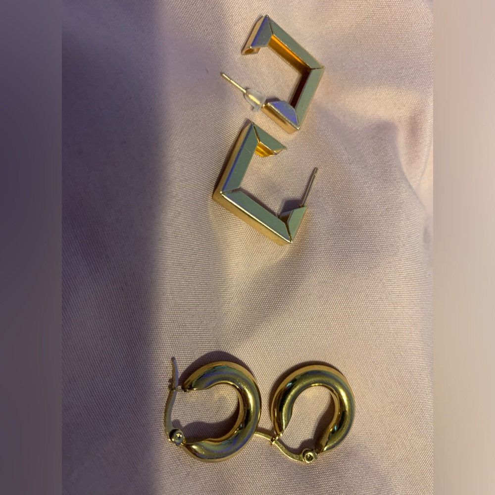 Two sets of earrings